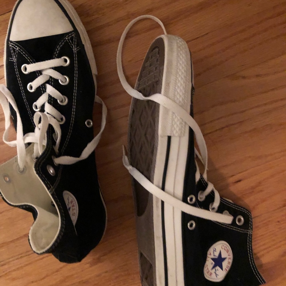 Converse sneakers , worn ones inside .